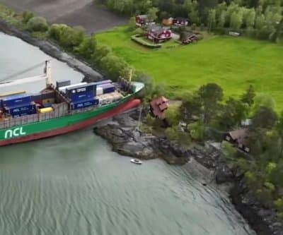 Thumbnail for Cargo Ship Barely Misses Norwegian Home in Byneset Fjord Wake-Up